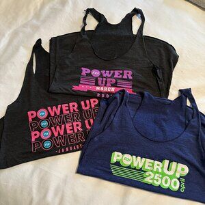 Collection of FLYWHEEL SPORTS Power Up Challenge Shirts